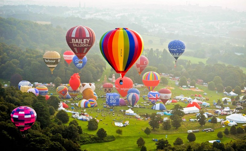 Hot air balloons taking off from Ashton Court for Bristol International Balloon Fiesta